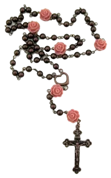 a rosary with pink roses on it