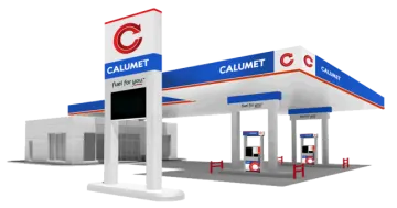 a white gas station with a blue and red sign
