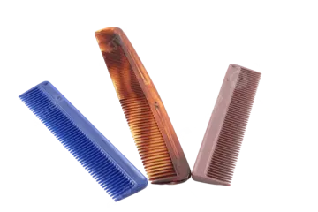two combs on a white background