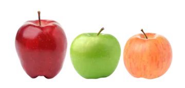 three apples in different colors and sizes