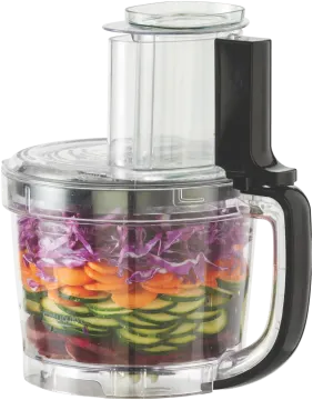 a food processor with vegetables in it