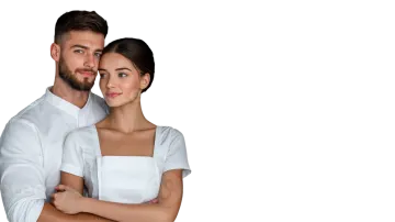 a man and woman standing together with their arms crossed