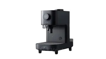 a black coffee machine on a white background