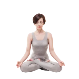 a woman sitting in the middle of a yoga pose
