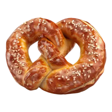 a close up of two pretzes with sesame seeds