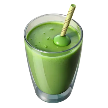 a green smoothie in a glass with a straw