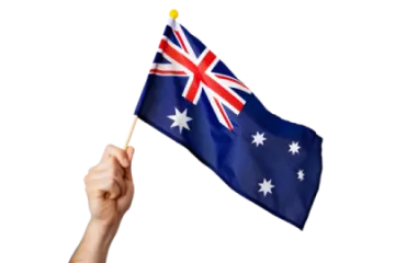 a hand holding an australian flag