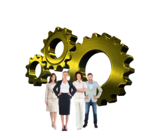 a group of people standing next to a gear wheel