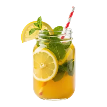 a glass filled with lemon and mint