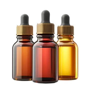 three bottles of essential oil on white background