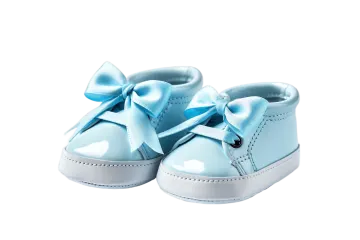 a pair of baby shoes with a blue bow