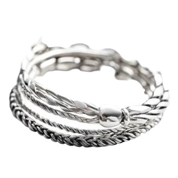 a stack of silver rings on a white background