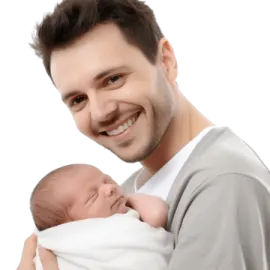 a man holding a baby in his arms