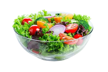 a salad in a glass bowl