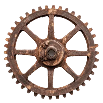 an old rusty gear wheel on a white background