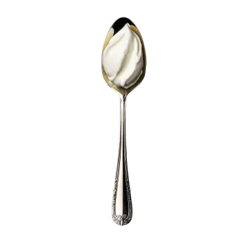 a spoon with whipped cream on it