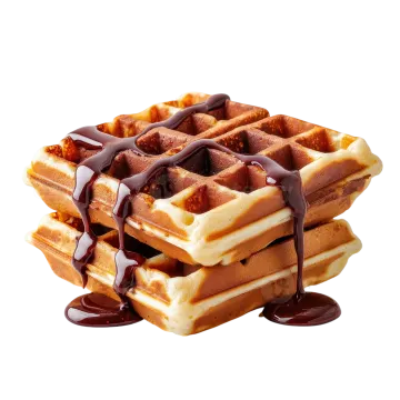 a stack of was with chocolate sauce on top