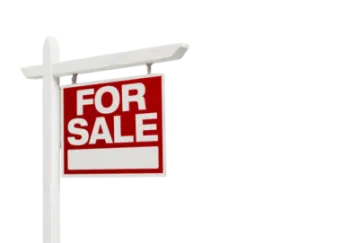 a red for sale sign on a white pole