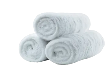 a pile of white towels on a white background