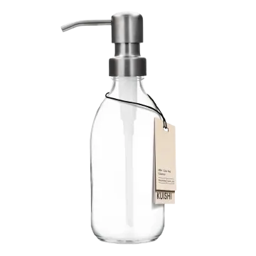 a glass bottle with a metal handle