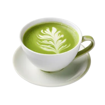 a cup of green tea on a saucer