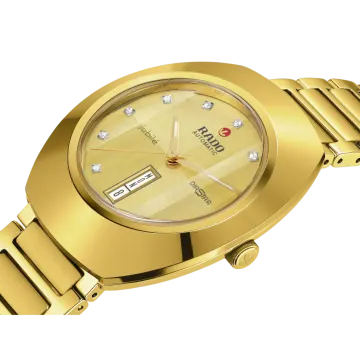 a gold wrist watch with diamonds