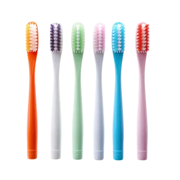 four different colored toothbrushs on a white background