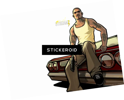 a man sitting on top of a car