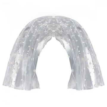 a white arch with gold and silver decorations