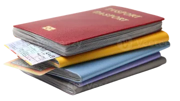 a stack of passports and money