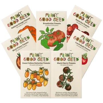 four seed packets with different vegetables on them