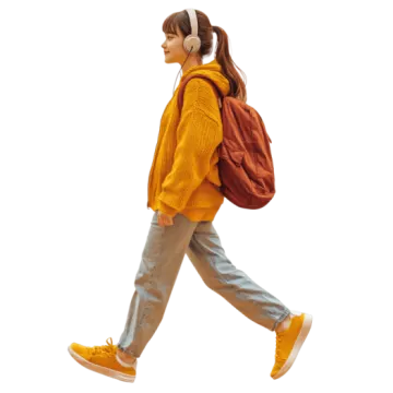 a woman walking with a backpack on her back