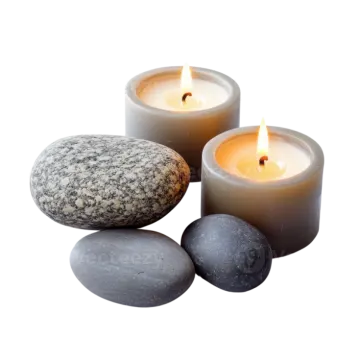 three candles and stones on a white background