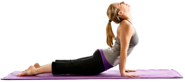 a woman doing yoga on a purple mat
