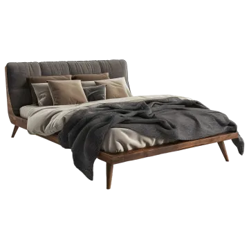 a bed with a blanket and pillows on it