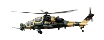 a military helicopter flying through the air