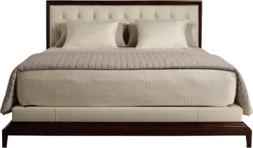 a bed with two pillows on top of it