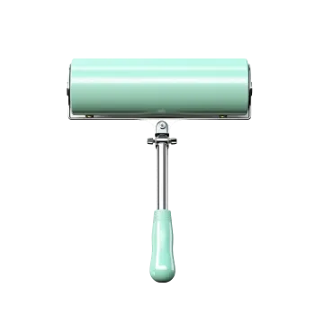 a green paint roller on a white background