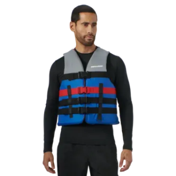 a man wearing a blue and red life jacket