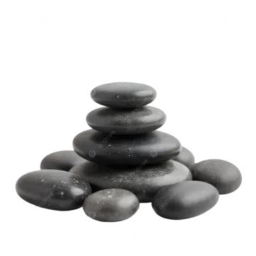 a pile of black stones on a white background
