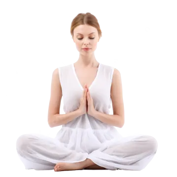 a woman is sitting in the lotus position