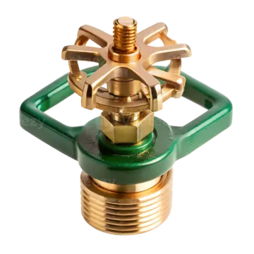 a brass - plated propor with green handle