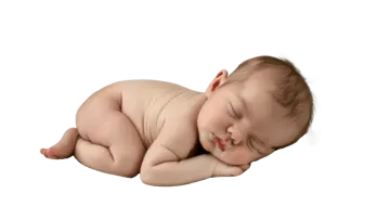 a baby sleeping on a white background