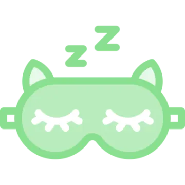 a green cat sleeping mask with eyes closed