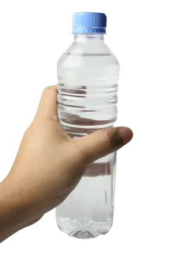a hand holding a bottle of water