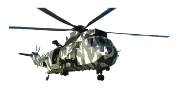 a military helicopter flying through the air