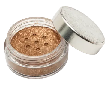 a close up of a jar of gold glitter