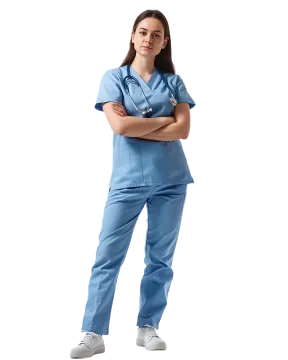 a woman in scrubs standing with her arms crossed