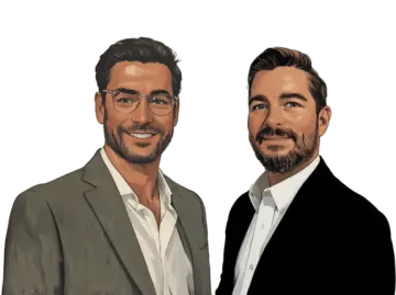 two men in suits, one with a beard and the other with glasses