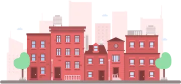 a red building with trees and buildings in the background